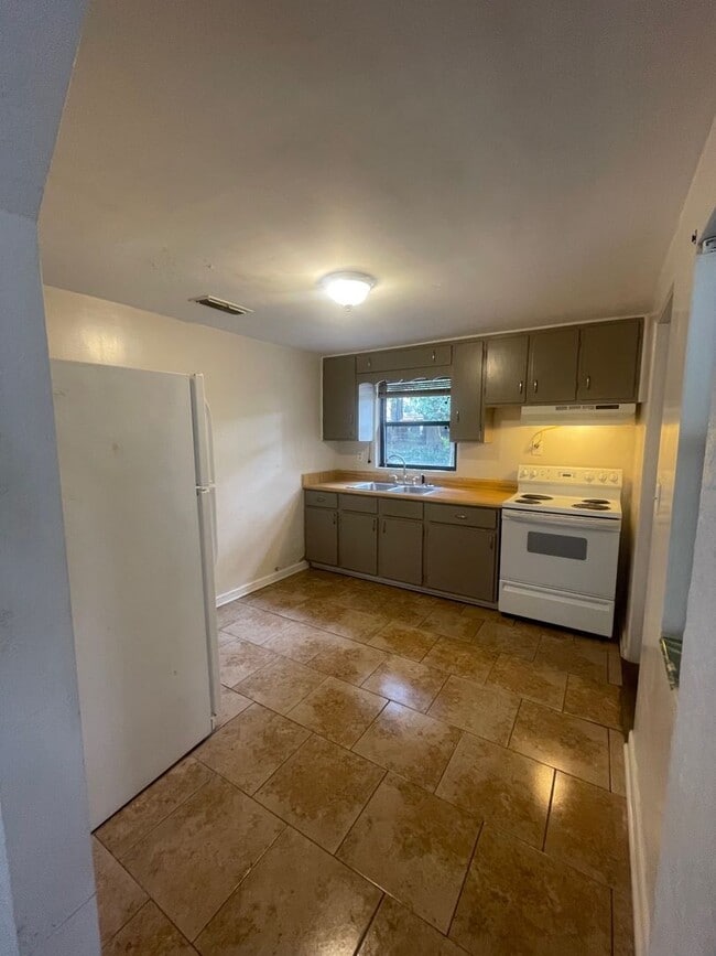 Photo - 2 Bed 1 Bath Home | Carport | Pet Friendly with Fenced Yard | Washer Dryer Hook Ups | Section 8 W...