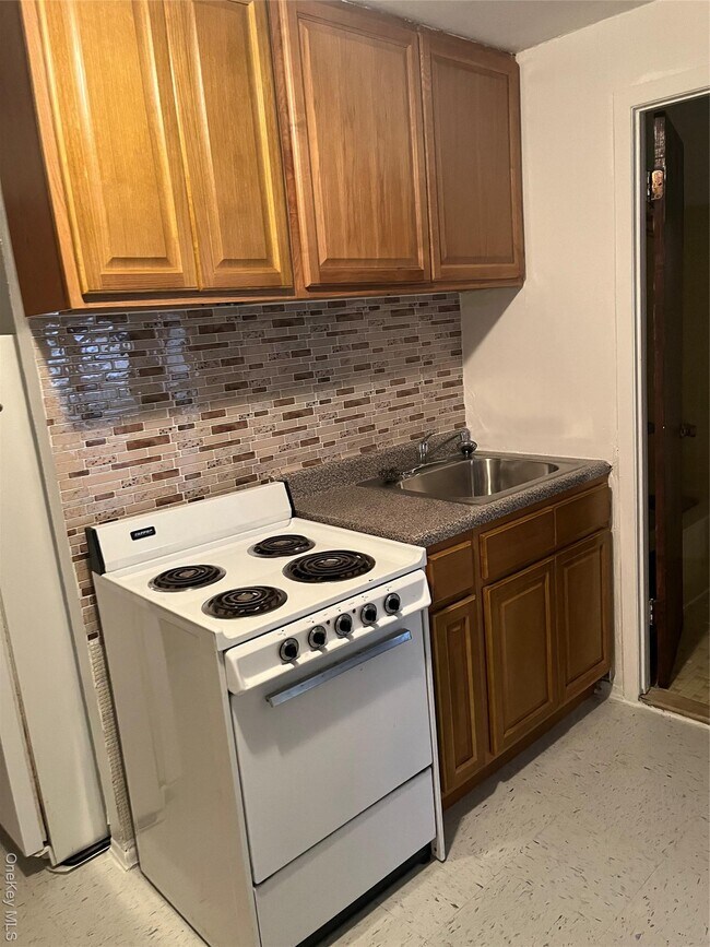 Photo - 91-04 75th St Unit 1