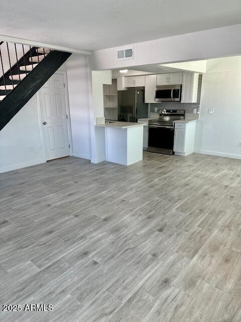 Building Photo - 1504 E Indianola Ave Unit 3
