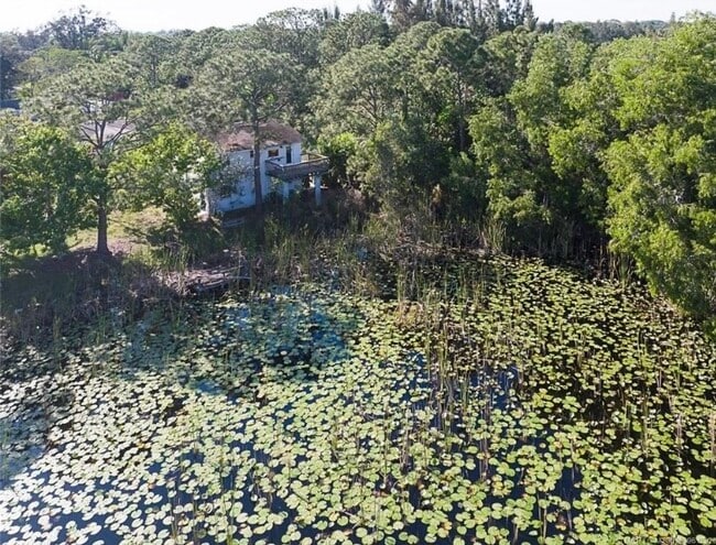 Building Photo - 6237 SE Lake Circle Dr Unit A