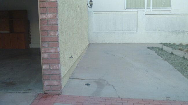 GUEST PARKING SPACE TO RIGHT OF 2 CAR GARAGE - 2106 Clark Ln