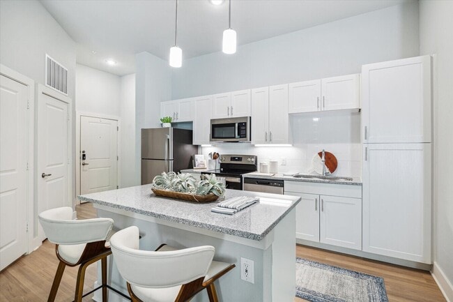 Building Photo - Morning Coffee Hits Better Here Unit FHH1