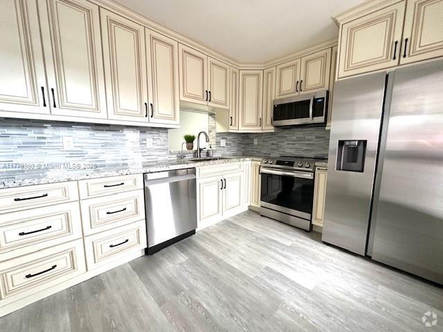 Building Photo - 301 NE 14th Ave Unit 401 Rental