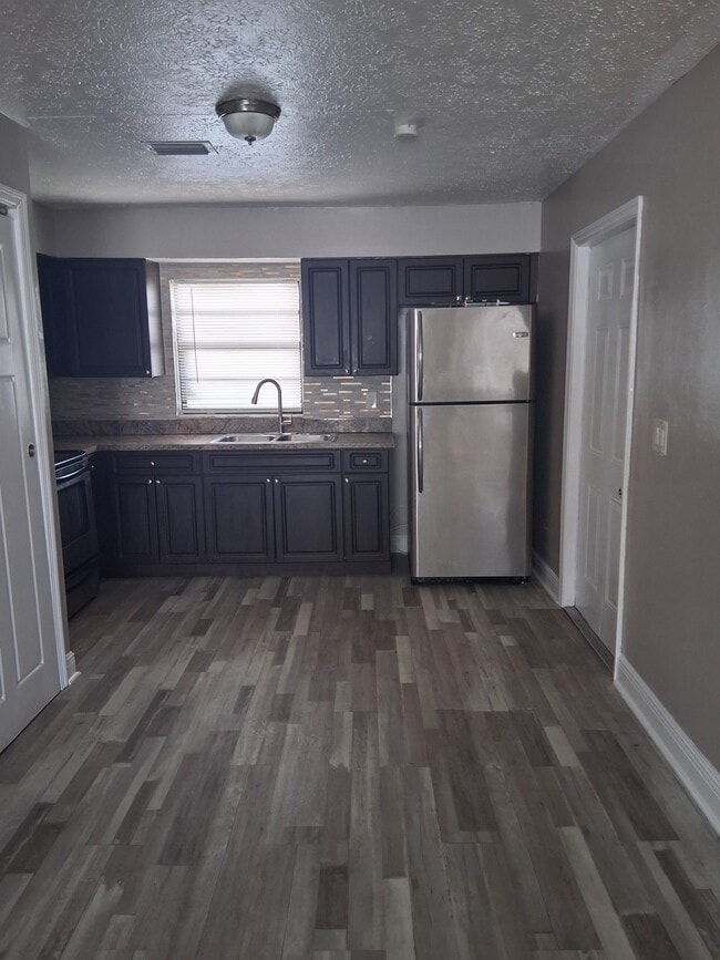 Building Photo - 9420 N 50th St Unit A