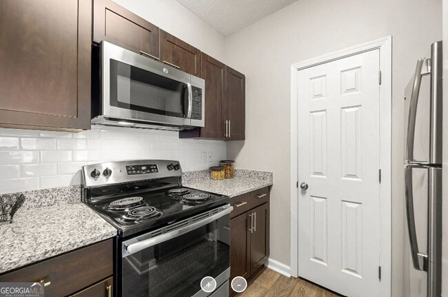 Photo - 7150 Peachtree Dunwoody Rd NE Unit 1028