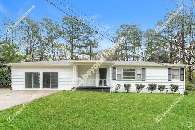 Building Photo - This Cozy 4 bedroom / 2 full bath and 2,09... Rental