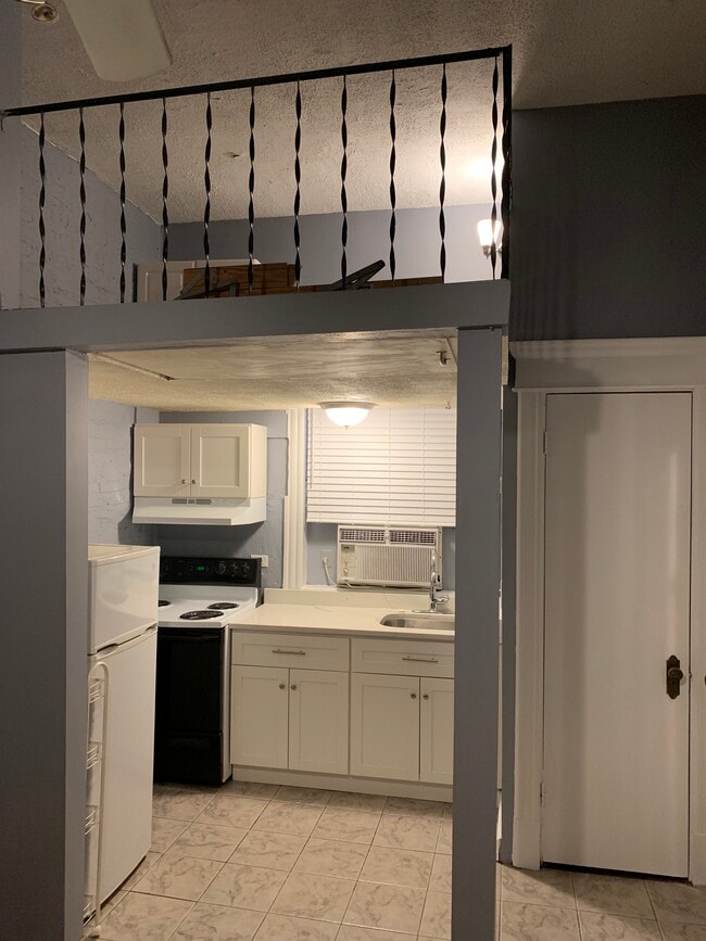 Kitchen - new cabinets and quartz countertop - 2800 N Pine Grove Ave Unit 1i