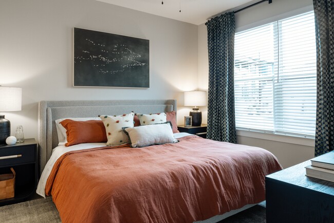 Bedroom with hard-surface vinyl plank flooring