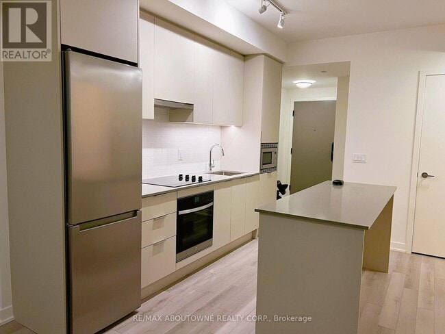 Photo - 3079 Trafalgar Rd Unit 1405