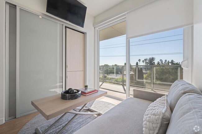 Building Photo - 5875 Interceptor St Unit Petite Suite - 112C Rental