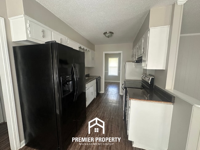Photo - Beautiful 3BR/2BA Bartlett Cove | 1,668 Sq Ft, Brick Fireplace & Dual Dining Areas