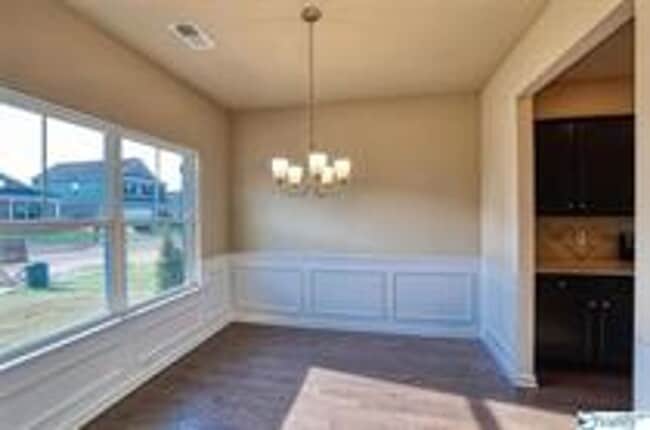 Photo - COMING SOON! Welcome to the Carlyle—where classic brick farmhouse charm meets a sleek, modern lif...