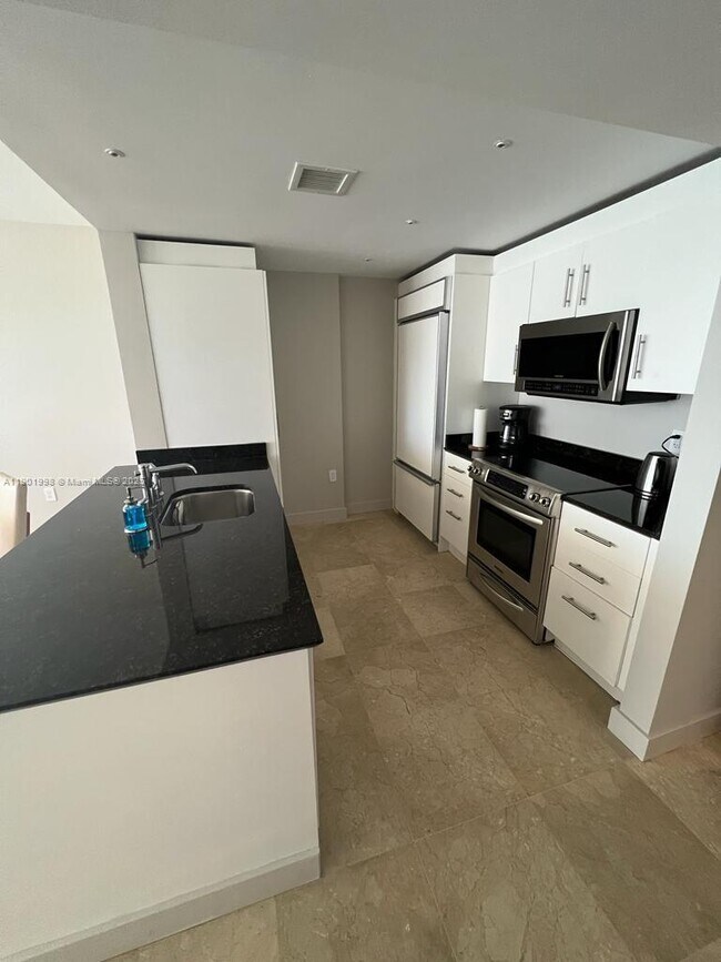 Photo - 10275 Collins Ave Unit 915