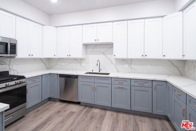 Building Photo - 3672 Jasmine Ave Unit 401 Rental