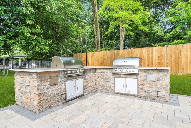 Elevate your outdoor gatherings at Eagle Rock Apartments at Bel Air with our modern grilling area, perfect for barbecues and socializing. Enjoy serene surroundings and stylish amenities. Schedule your visit today!