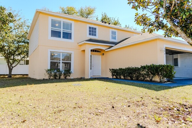 Building Photo - Spacious 4-Bed Groveland Home with Attached Garage, Central Air, and Private Patio