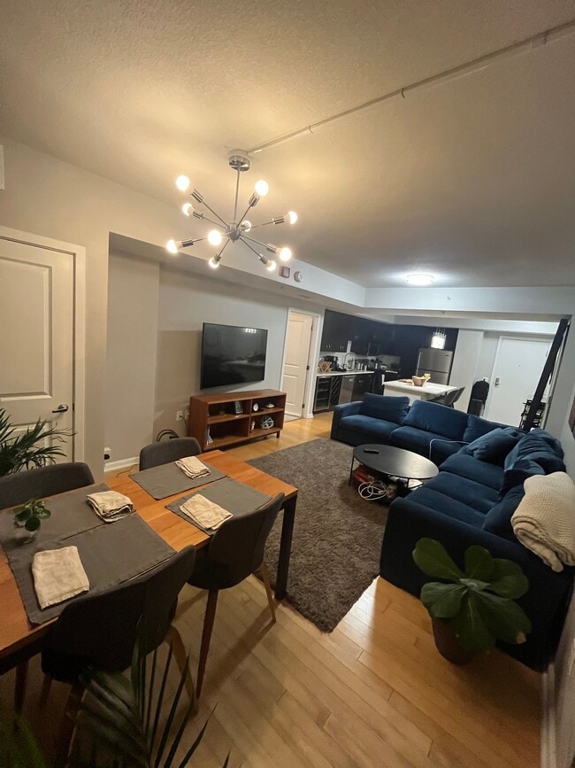 Living room and kitchen. View from window. - 440 L St NW Unit 304