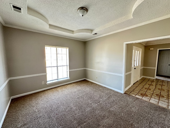 Photo - Grand 4BR/2BA Near Southwind | 2,438 Sq Ft, Stone Fireplace, Soaking Tub & 2-Car Garage