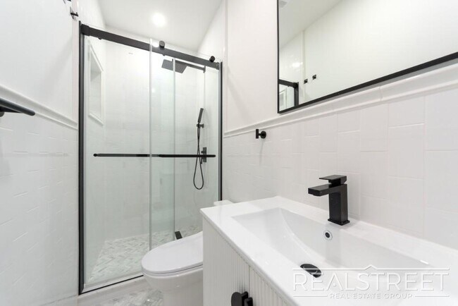 Photo - Stunning New 2 Bed 2 Bath with Backyard in... Unit 2