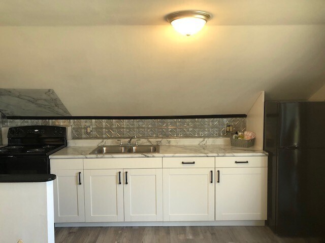 remodeled kitchen Including new stove and fridgerator - 301 N Main St Unit Apartment 3