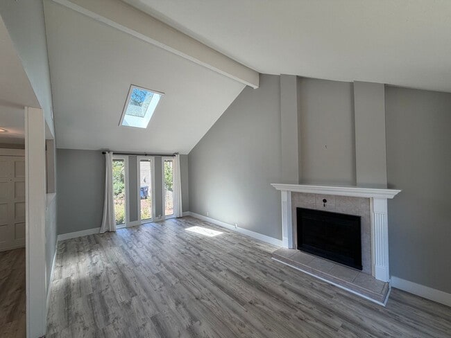 Photo - Spacious 4BR/3BA Home with Deck, Fenced Yard & Garage