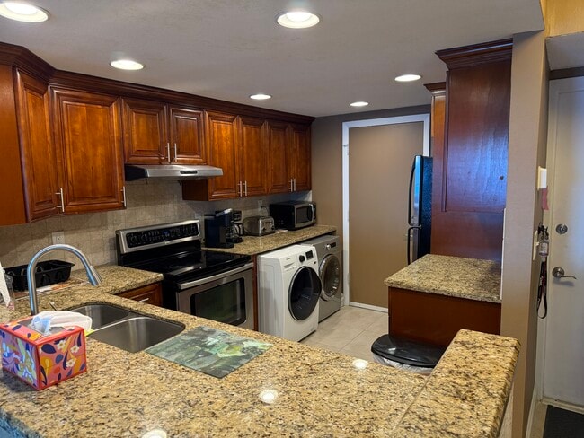 Fully equipped kitchen - 6000 N Ocean Blvd Unit Starlight Towers