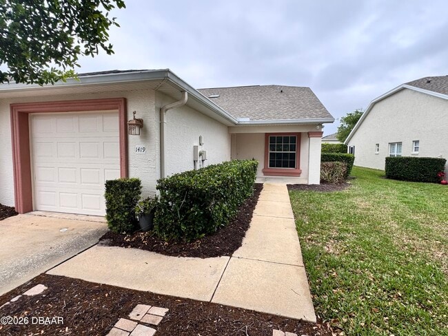 Building Photo - 1419 Coconut Palm Cir