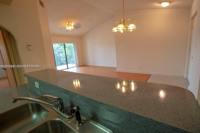 Building Photo - 10105 W Sunrise Blvd Unit 303