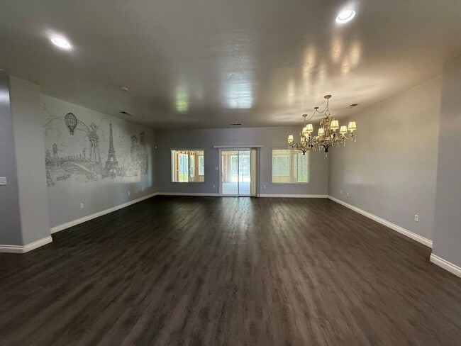Photo - Beautiful 4 Bedroom, 3 Bathroom Home with Enclosed Patio & Stunning Backyard
