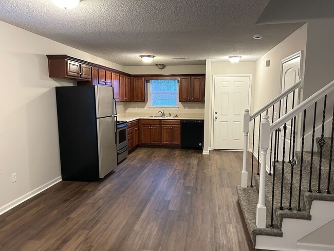 Photo - 3 Bed 2 Car Duplex in Grain Valley (New Flooring, Carpet, and Paint)