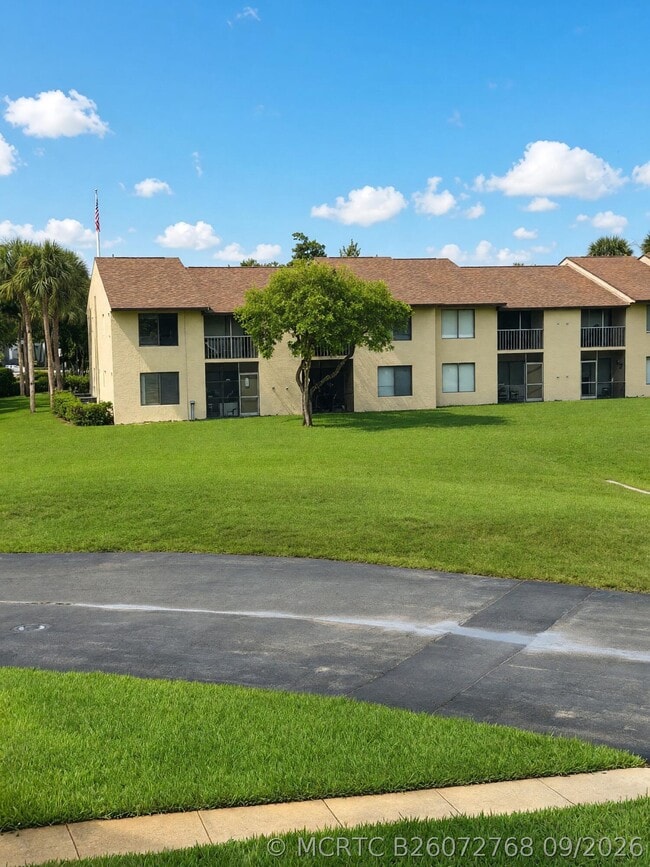 Building Photo - 6716 Palmetto Cir S Unit 202