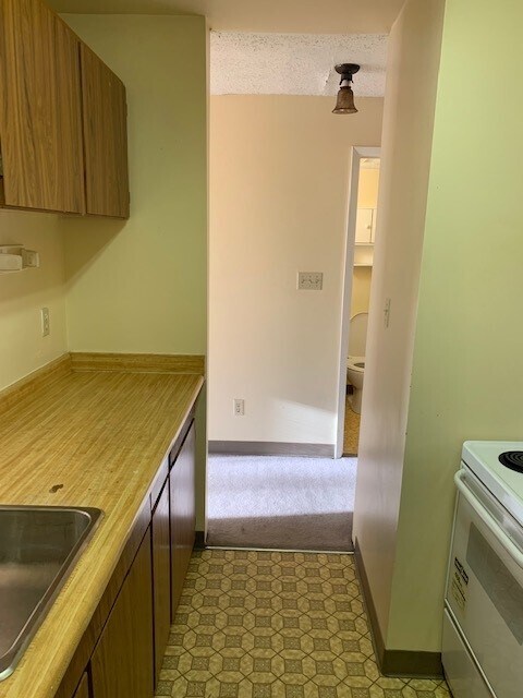 Photo - 10311-10396 96 Ave