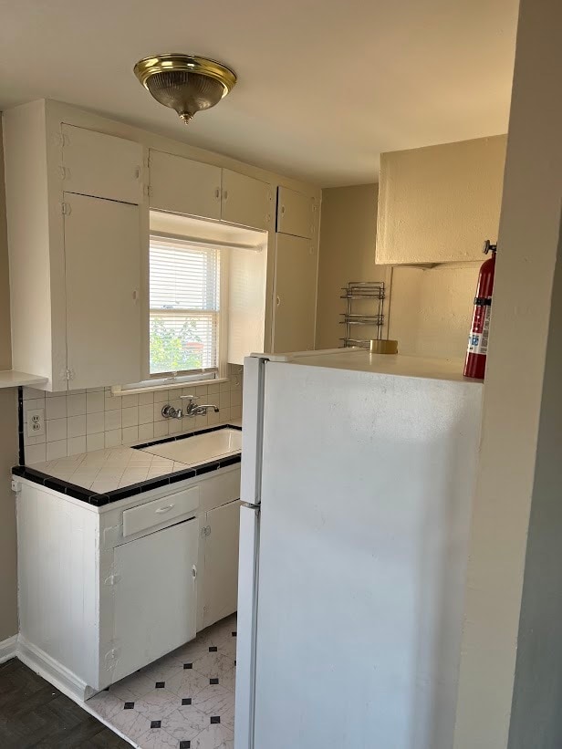 Kitchen, includes fridge/freezer, gas stove/oven. - 1162 W 24th St Unit 1162 W 24