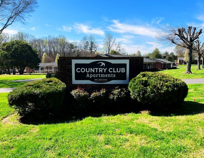 Country Club Apartments - Country Club Apartments