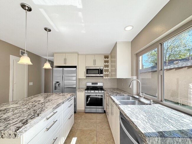 Photo - Beautiful 4B 2BA Home w/ AC, W/D, & Solar Panels!