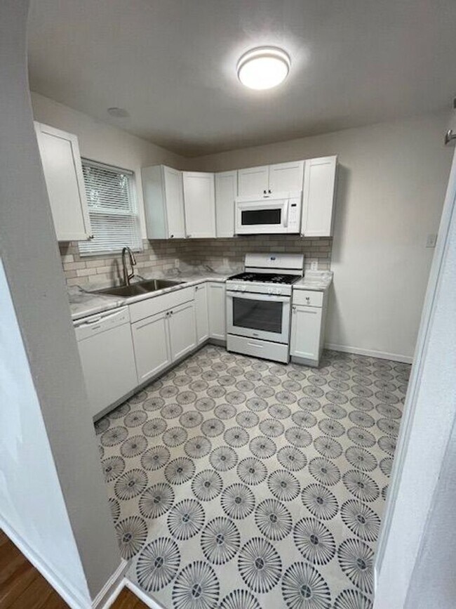 Photo - Charming 2-bedroom home, fully renovated and sharing 8 acres