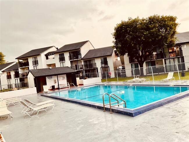 Building Photo - 13045 SW 68th St Unit 101