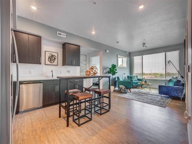 Living Room With Kitchen View - Element 31 Apartments