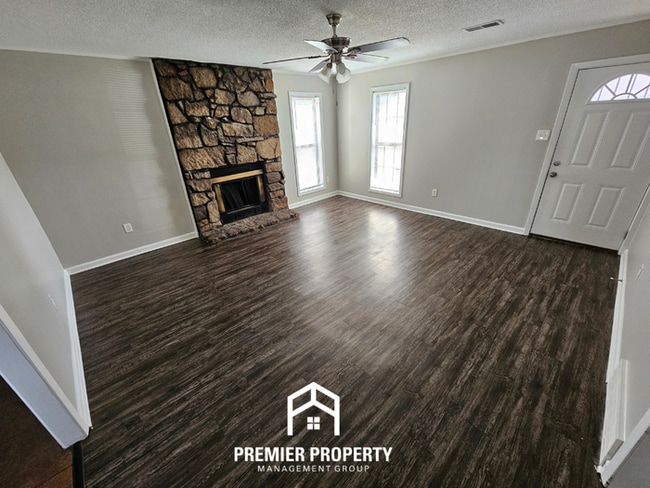 Photo - Charming 3BR/2BA Near Kirby | Hardwood Floors, Rustic Fireplace & Large Yard