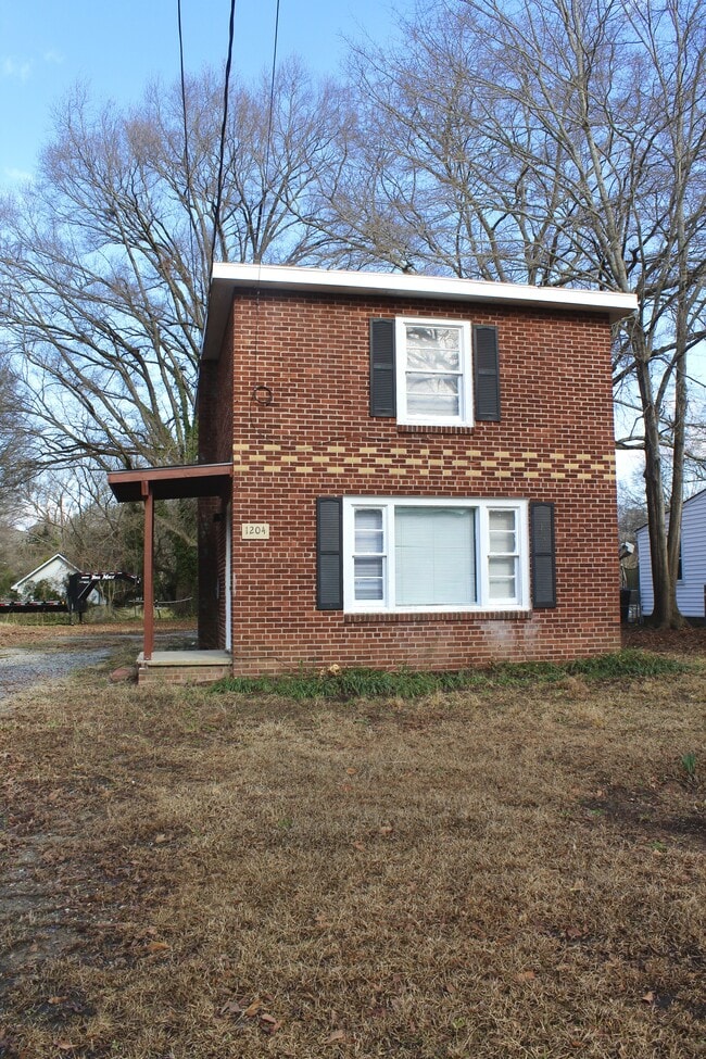 Building Photo - 1204 W Mauney Ave