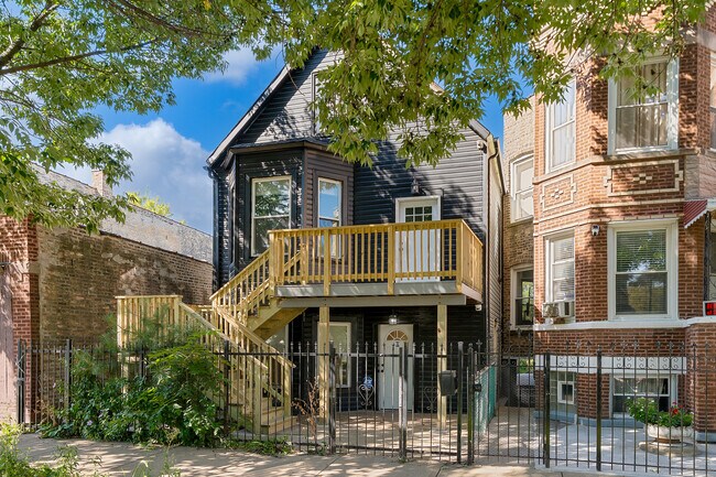 Building Photo - 1406 N Kildare Ave Unit 1