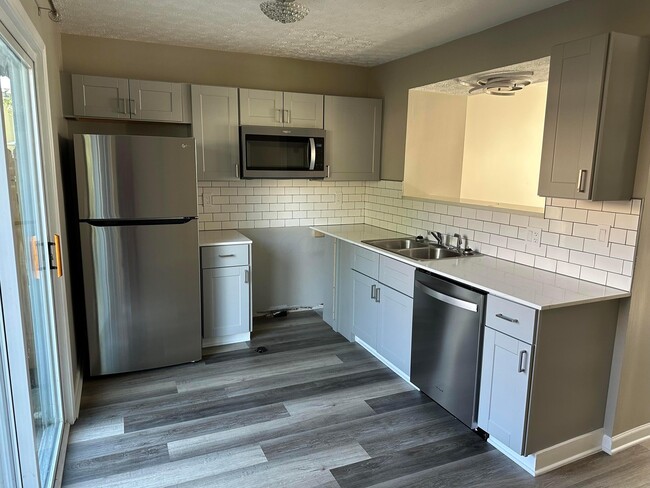 Building Photo - 7806 Barkwood Dr Unit 10B