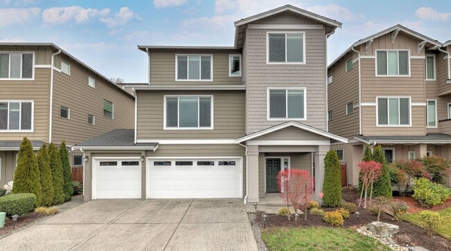 Building Photo - Brightview 4-Bedroom with Main-Floor Bedroom, 3-Car Garage, and Exceptional Outdoor Space