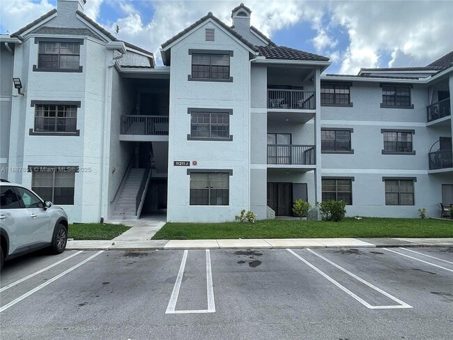 Building Photo - 11211 W Atlantic Blvd Unit 202