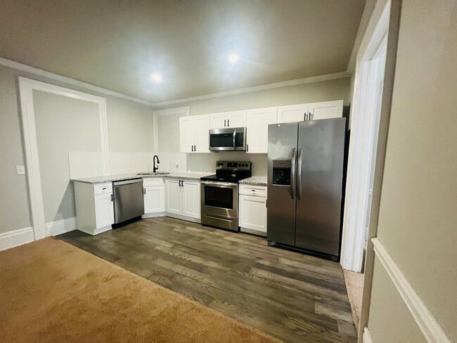 Building Photo - 1055 Walnut St Unit A