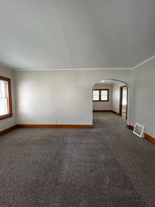 Photo - Charming 3-Bedroom Home with Finished Attic, Enclosed Front Porch & Spacious Backyard