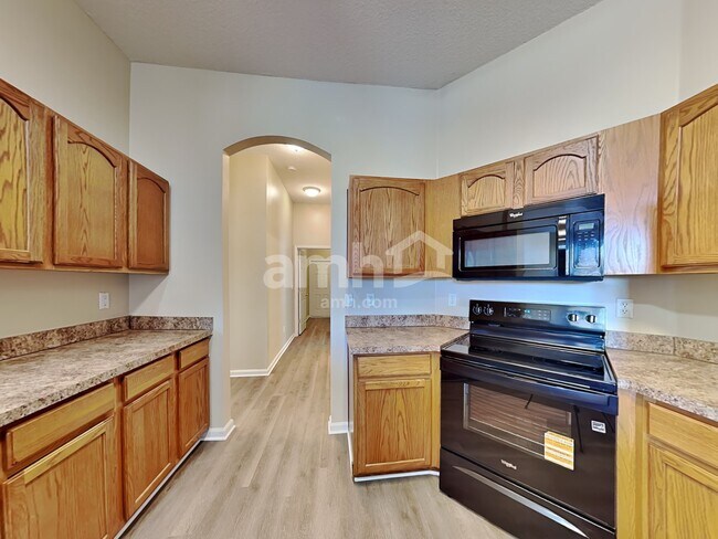 Photo - 7117 Rapid River Dr W