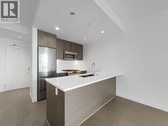 Photo - 9060 University Crescent Unit 9xx