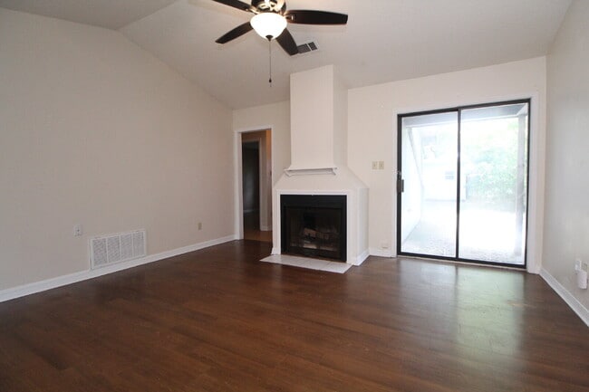 Photo - 2BR Home with Wood-Look Flooring, Fenced Backyard & Private Patio Unit D