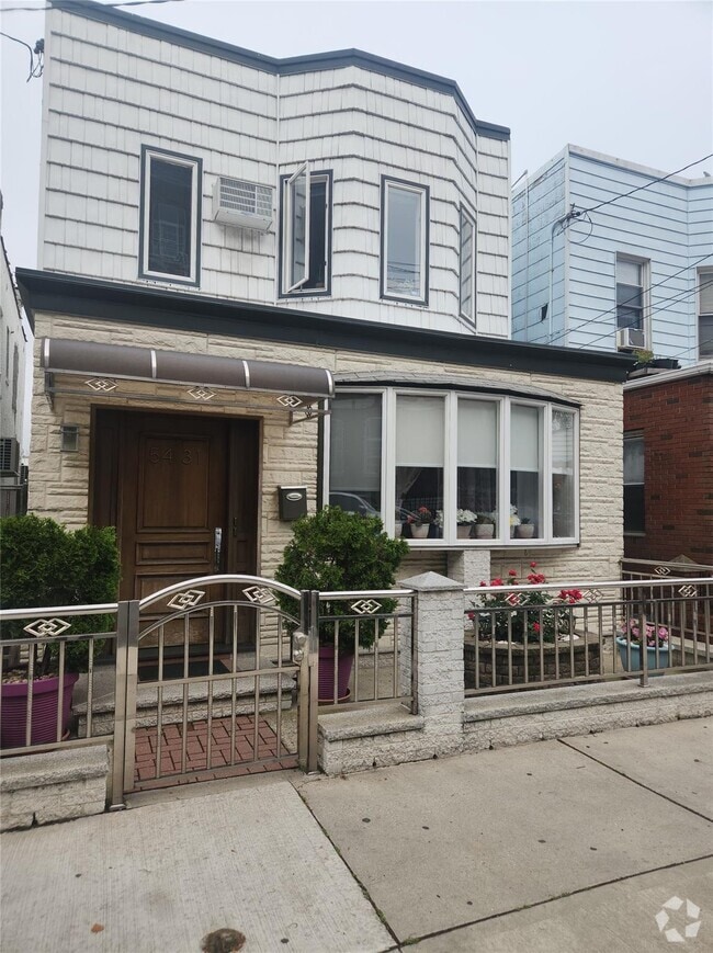 Building Photo - 54-31-54-71 71st St Rental
